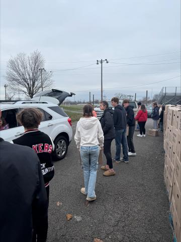 Student United Way distributing Thanksgiving food boxes